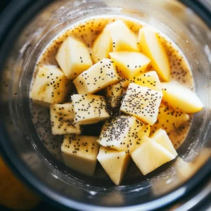 Blending Ingredients for Vegan Pear Banana Smoothie